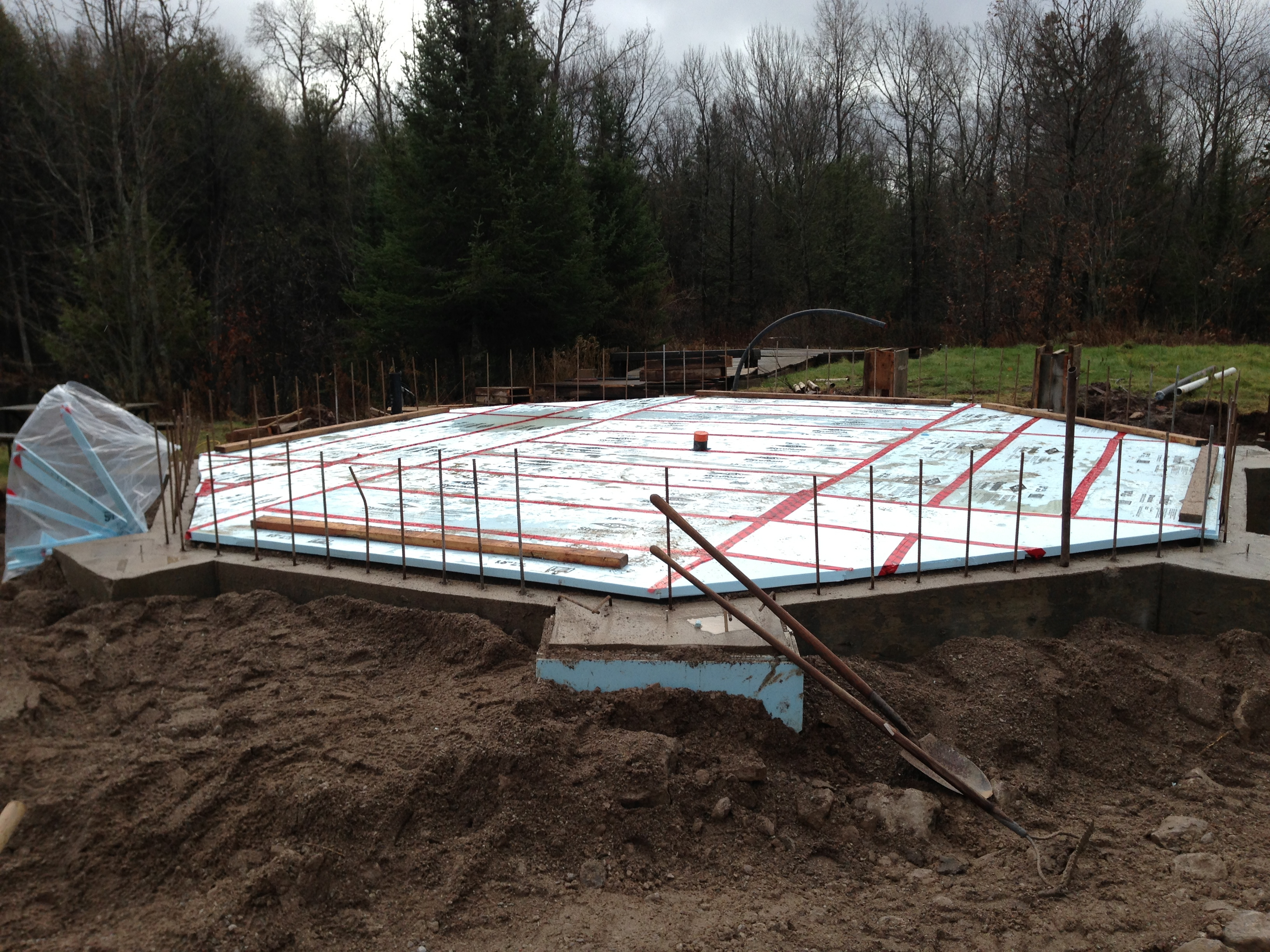 sea container cabin foundations 10 back filled and insulated octagon