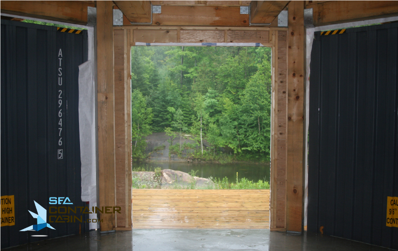 Shipping-Container-Cabin-Great-Room-Overlooking-Deck-Workbench