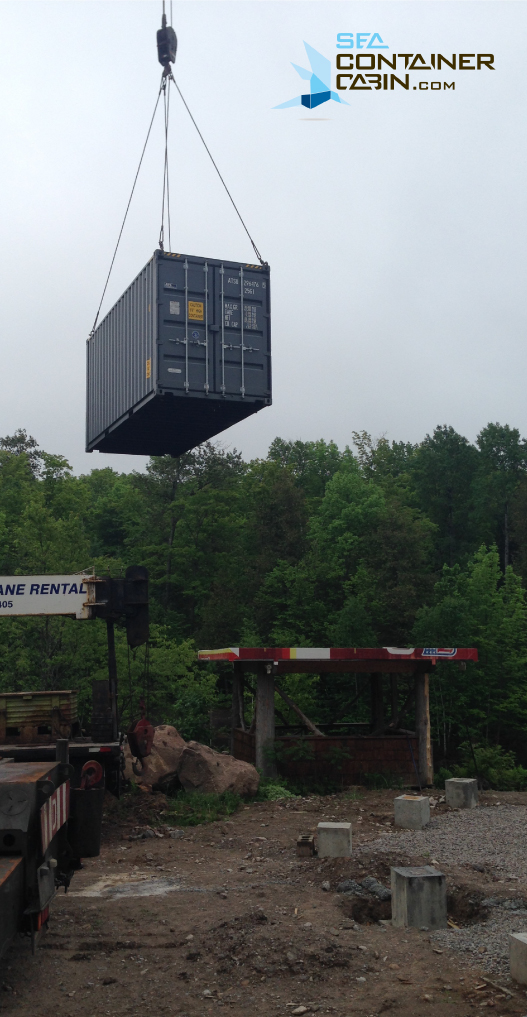 craning-shipping-container-cabin-workbench